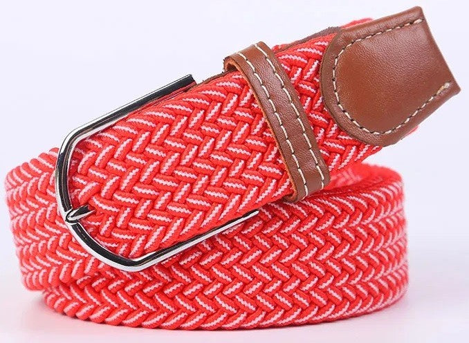 A red and white woven elastic belt with a brown leather keeper loop and a silver metal buckle, coiled on a white background.