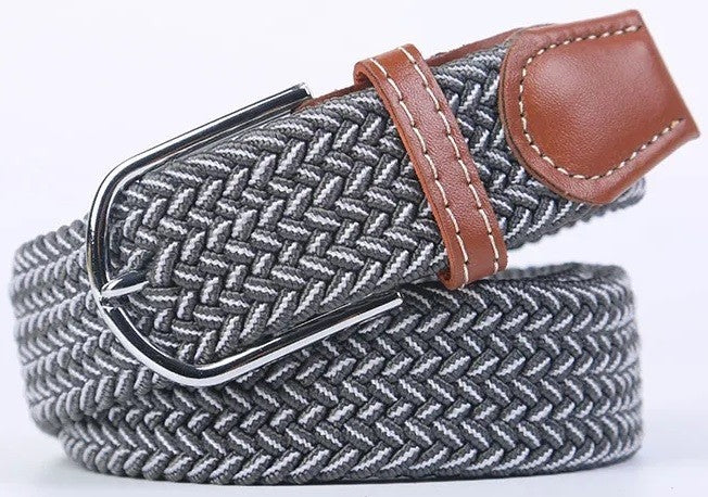 A woven elastic belt with a gray and white herringbone pattern, brown leather accents, and a silver metal buckle, shown on a white background.
